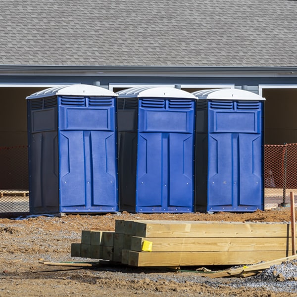 what is the cost difference between standard and deluxe porta potty rentals in Cotesfield